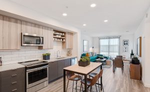 3 BR Apartments in Redwood City CA - Encore - Modern Kitchen with Stainless-Steel Appliances and Kitchen Island